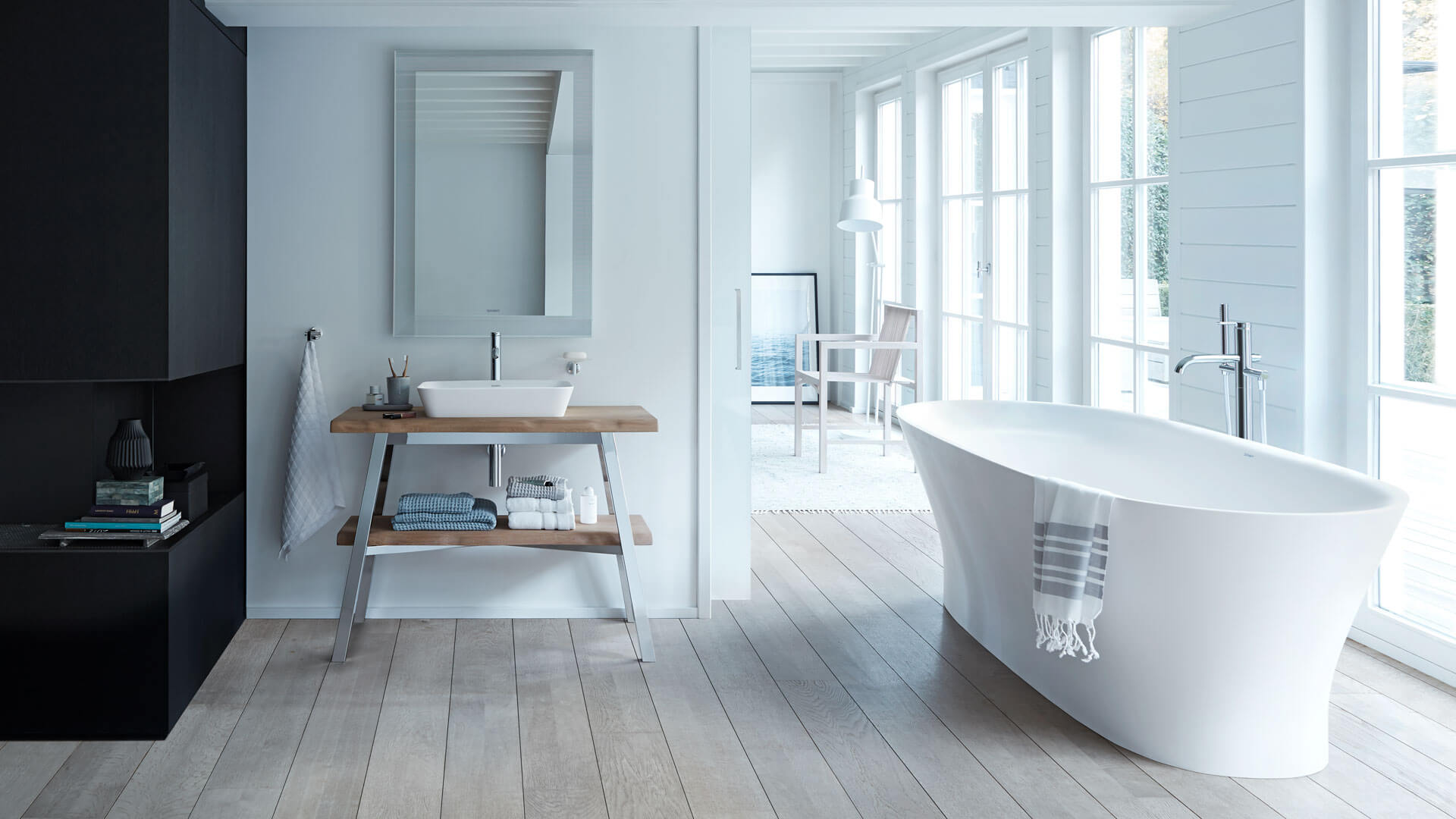 Bright bathroom with large CapeCod bathtub
